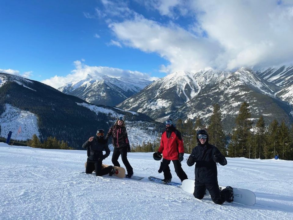 snowboarders on mountain during WSC course